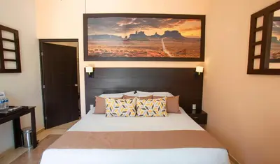 Cama o camas de una habitación en Hotel Esmeralda