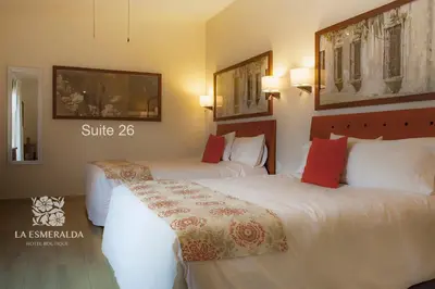 Cama o camas de una habitación en Hotel Esmeralda