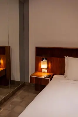 Cama o camas de una habitación en Flor de Mayo Hotel & Restaurant