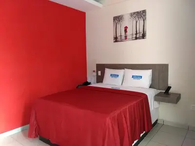 Cama o camas de una habitación en Hotel Guivá San Pablo