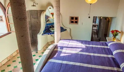 Cama o camas de una habitación en HEVEN Residence