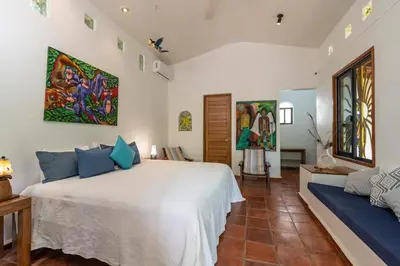 Cama o camas de una habitación en Hotel Villa Mozart y Macondo