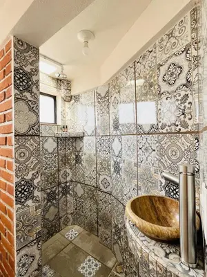 Un baño de Hotel Boutique Jardín de Flores