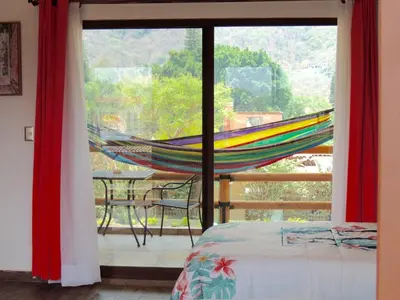 Un balcón o terraza de Hotel Boutique Jardín de Flores