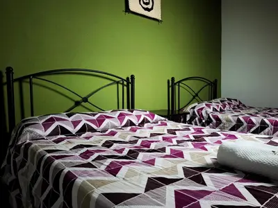 Cama o camas de una habitación en Hotel el Descanso