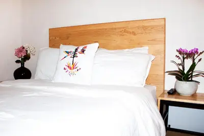 Cama o camas de una habitación en Hospedaje Donaji