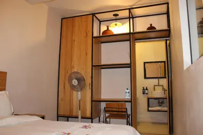 Cama o camas de una habitación en Hospedaje Donaji