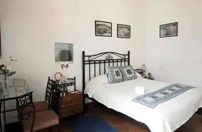 Cama o camas de una habitación en Quinta Alhóndiga Galindo Hotel Boutique