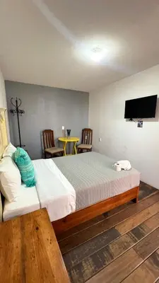 Cama o camas de una habitación en Hostal Mago