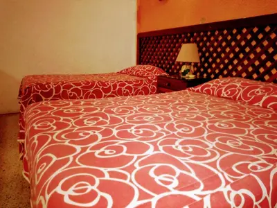 Cama o camas de una habitación en Hotel Calendas