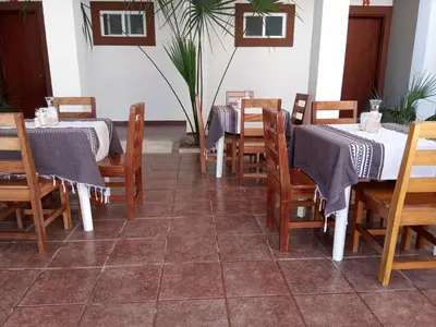 Un restaurante o sitio para comer en Hotel D Abril