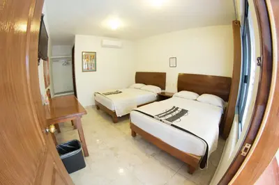 Cama o camas de una habitación en HOTEL RICARLO