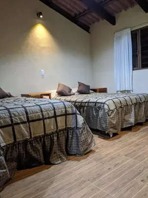 Cama o camas de una habitación en Cabaña El Salto