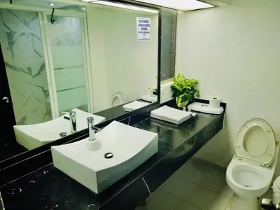 Un baño de Hotel acapulco y suites mediterrane