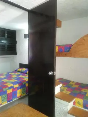 Cama o camas de una habitación en Mar Paraiso Queen