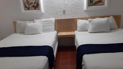Cama o camas de una habitación en Mar Paraiso Queen
