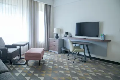 Una televisión o centro de entretenimiento en Holiday Inn Tlaxcala by IHG