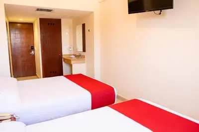 Cama o camas de una habitación en Mishol Bodas Hotel & Beach Club Acapulco Diamante