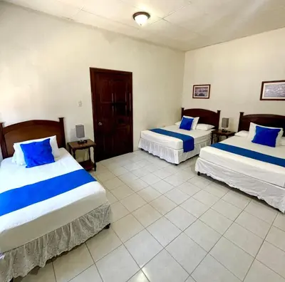 Cama o camas de una habitación en Hotel Casa Blanca