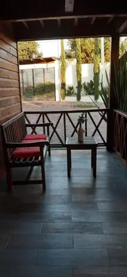 Un balcón o terraza de Cabañas La Finca