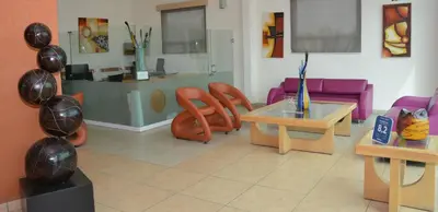 Zona de estar de Hotel Magico Inn