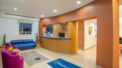 Zona de estar de Hotel Magico Inn