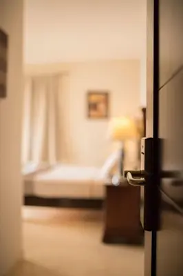 Cama o camas de una habitación en Gran Plaza Hotel Centro Histórico