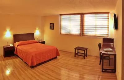 Cama o camas de una habitación en Hotel CR Tehuacan