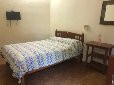 Cama o camas de una habitación en Hotel Posada Playa Manzanillo