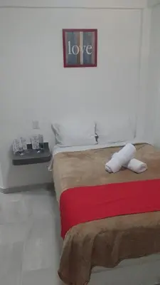 Cama o camas de una habitación en HOTEL EL EDEN IXTAPALUCA