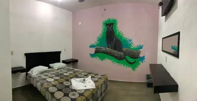 Cama o camas de una habitación en HOTEL LOS PINOS CENTRO