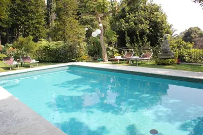 Piscina en o cerca de Tu cabaña Cuernavaca - hospedaje by Arcadia