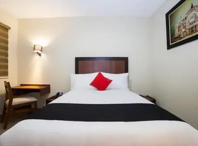 Cama o camas de una habitación en Hotel Colonial Acopinalco Inn