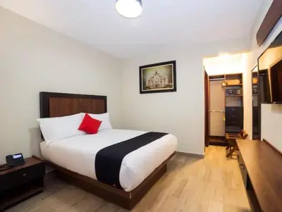 Cama o camas de una habitación en Hotel Colonial Acopinalco Inn