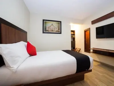 Cama o camas de una habitación en Hotel Colonial Acopinalco Inn