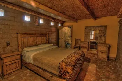 Cama o camas de una habitación en Hotel Finca Belén