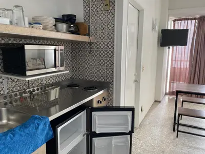 Una cocina o zona de cocina en Suite Espectacular Torres Gemelas