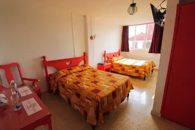 Cama o camas de una habitación en Hotel Castillo