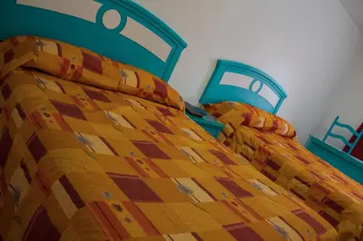 Cama o camas de una habitación en Hotel Castillo