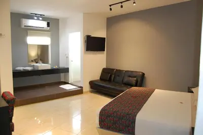 Una televisión o centro de entretenimiento en Hotel Dulce Boca