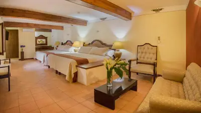 Cama o camas de una habitación en Hotel Casa Barrocco Oaxaca