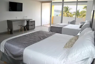 Cama o camas de una habitación en Hotel Infinity