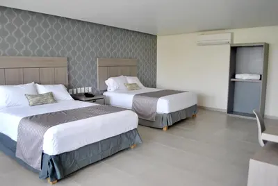 Cama o camas de una habitación en Hotel Infinity