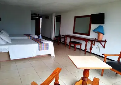 Cama o camas de una habitación en Hotel El Doral