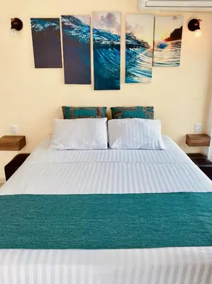 Cama o camas de una habitación en Alberca privada, vista al mar, frente playa foro boca