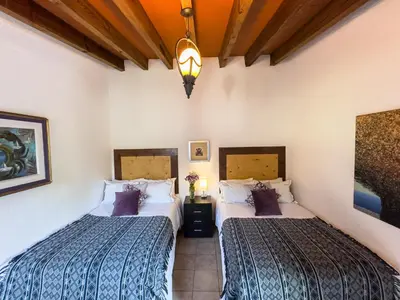 Cama o camas de una habitación en Hotel Boutique Bacaanda