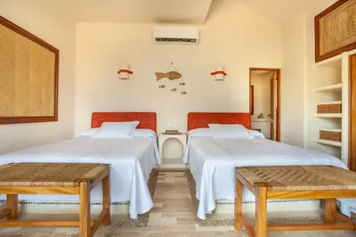 Cama o camas de una habitación en Villas San Vicente