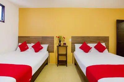 Cama o camas de una habitación en Hotel Villa Hermosa