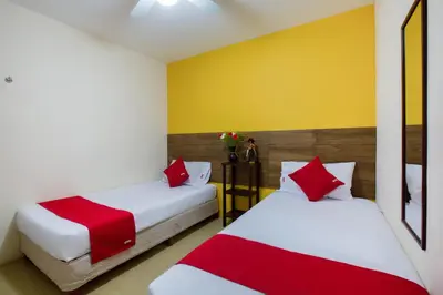 Cama o camas de una habitación en Hotel Villa Hermosa