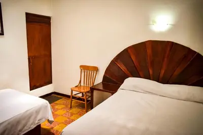 Cama o camas de una habitación en Hotel Posada Santa Anita